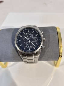 Citizen Eco-Drive Mens Chronograph Wrist Watch Model # H800 works great!!!