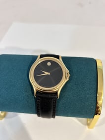 Movado Black Museum Dial Gold Tone Leather Band Mens Watch 87-E4-0863 works great! Needs bat