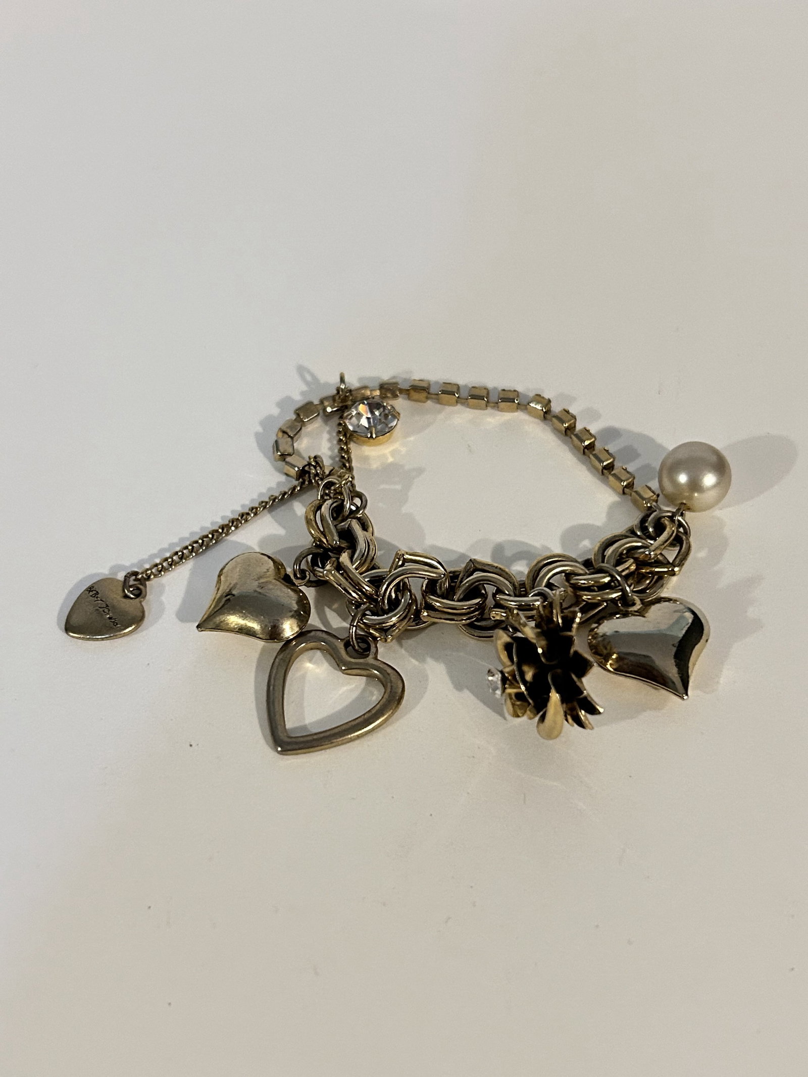 Vintage trinkit Bracelet 8": Vintage trinkit Bracelet 8" Please view all photos as they are part of the description and condition of this Item, Feel free to contact me with questions or picture requests! Used Item AS IS