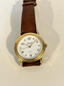 Guess Genuine Leather Strap Watch works great!!!