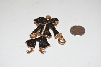 Vintage gold tone black enamel clown Brooch