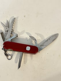 Wenger Swiss army knife worn scale cross