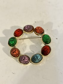 Vintage gold tone gem stone wreath scarab Brooch
