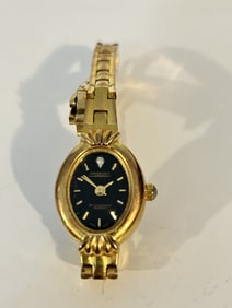 Womans Prestige By Waltham black Dial Gold Tone Case Watch works great!!!!