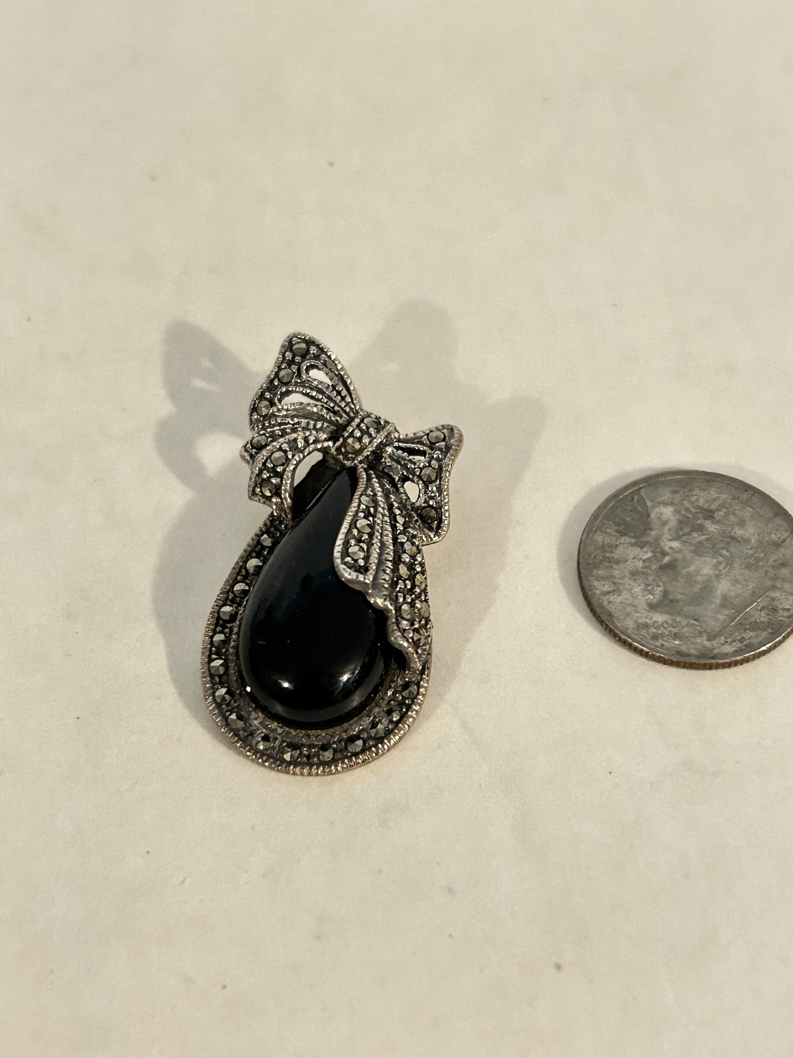 Vintage Sterling Silver marcasite onyx Pendant: Vintage Sterling Silver marcasite onyx Pendant Please view all photos as they are part of the description and condition of this Item, Feel free to contact me with questions or picture requests! Used I