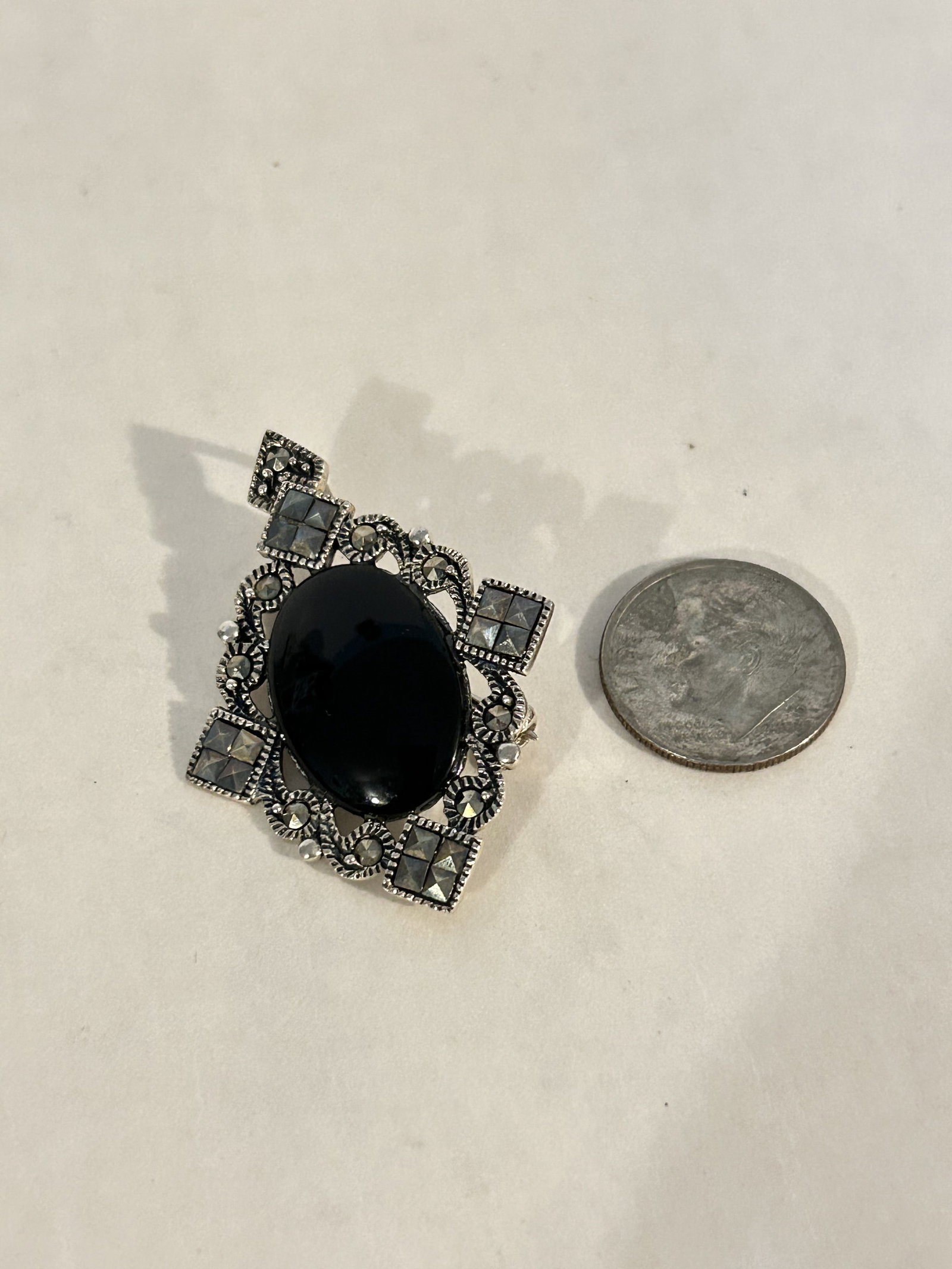 Vintage Sterling Silver marcasite onyx Pendant: Vintage Sterling Silver marcasite onyx Pendant Please view all photos as they are part of the description and condition of this Item, Feel free to contact me with questions or picture requests! Used I