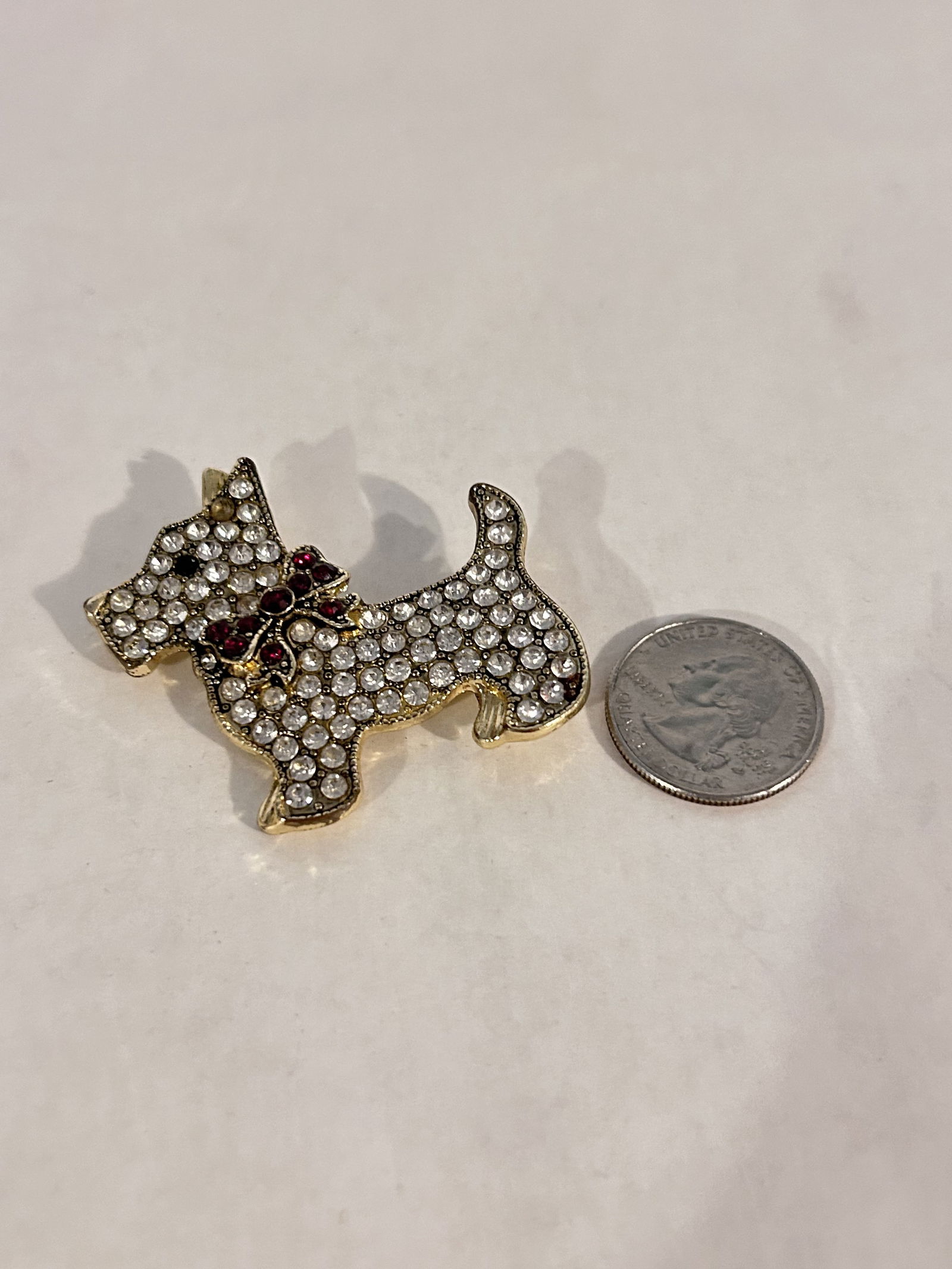 Vintage rhinestone dog monet Brooch: Vintage rhinestone dog monet Brooch Please view all photos as they are part of the description and condition of this Item, Feel free to contact me with questions or picture requests! Used Item AS IS