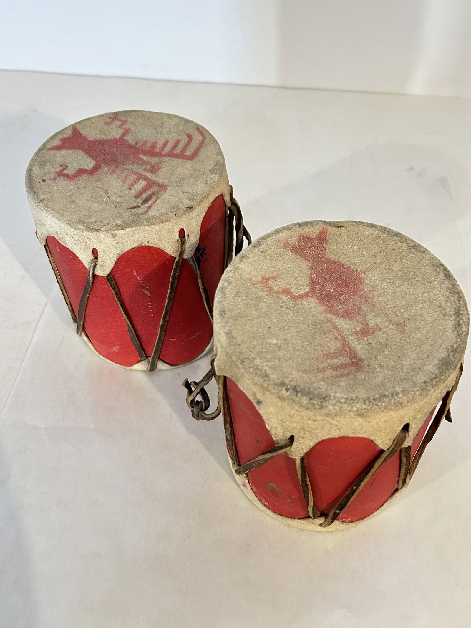 Vintage old Indian drums: Vintage old Indian drums Please view all photos as they are part of the description and condition of this Item, Feel free to contact me with questions or picture requests! Used Item AS IS