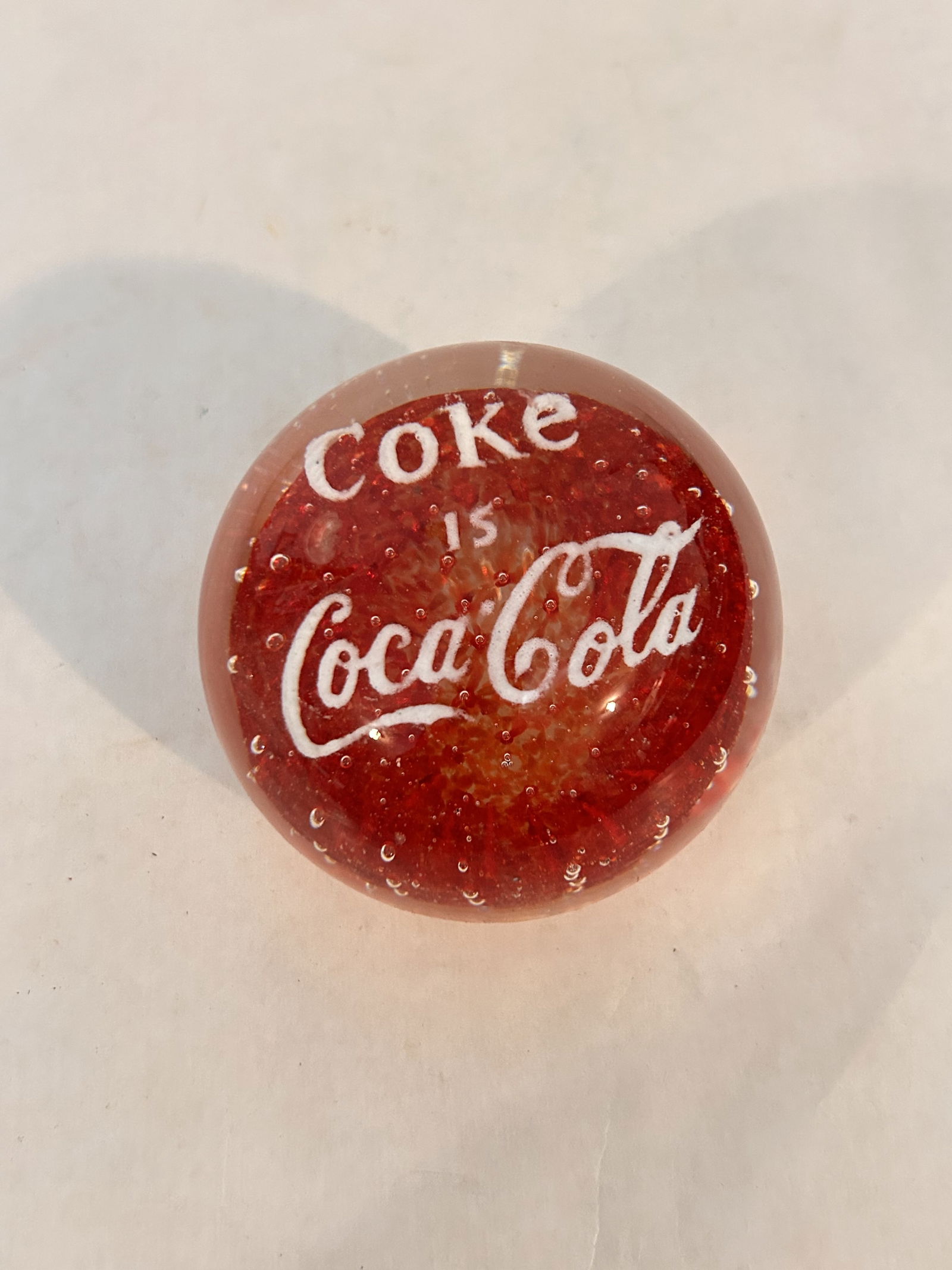 Vintage Coca Cola paper weight has a chip on it (1 of 4)