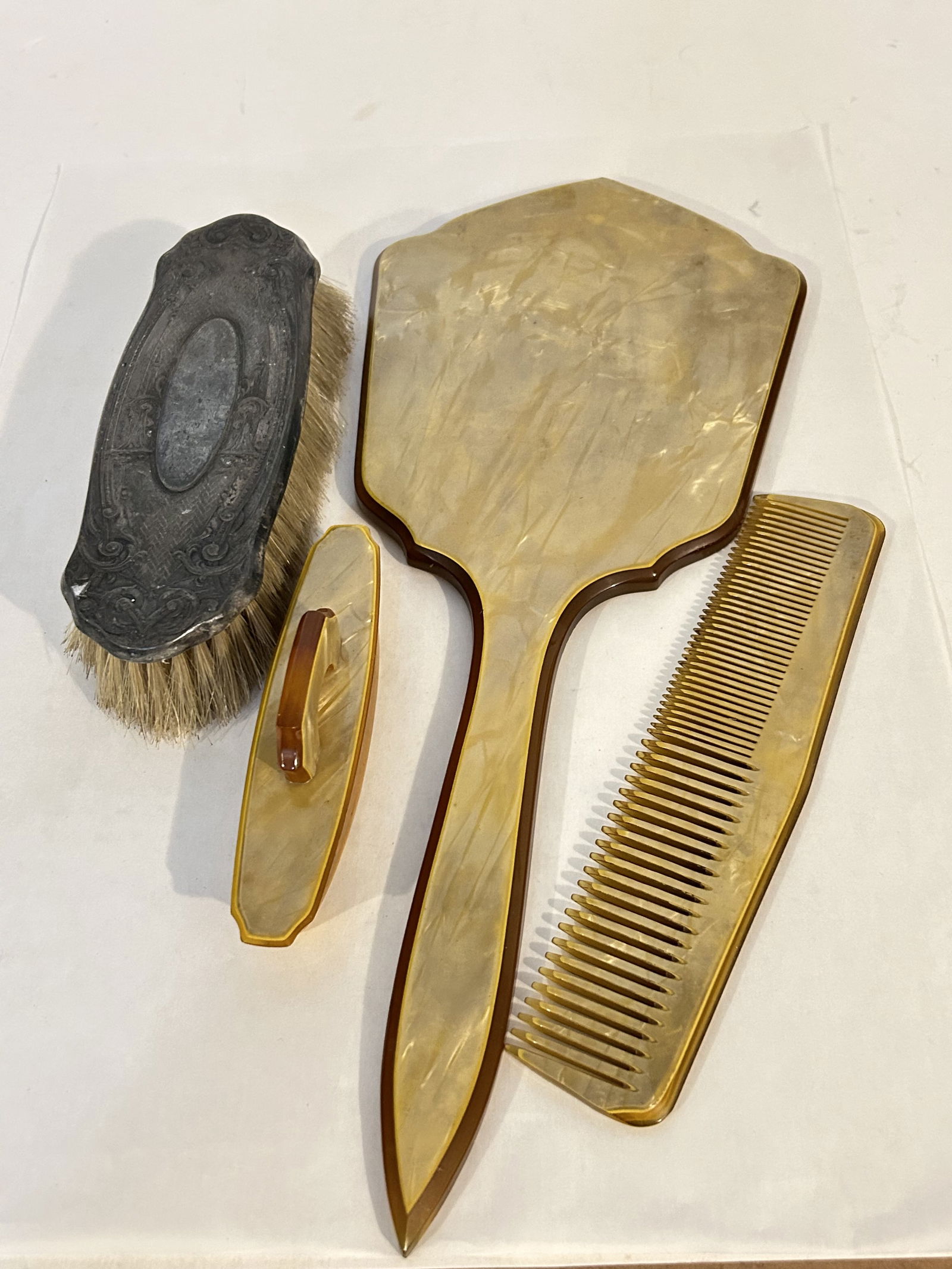 Vintage Butterscotch Pearlized Celluloid Hand-Held Vanity Set (1 of 5)