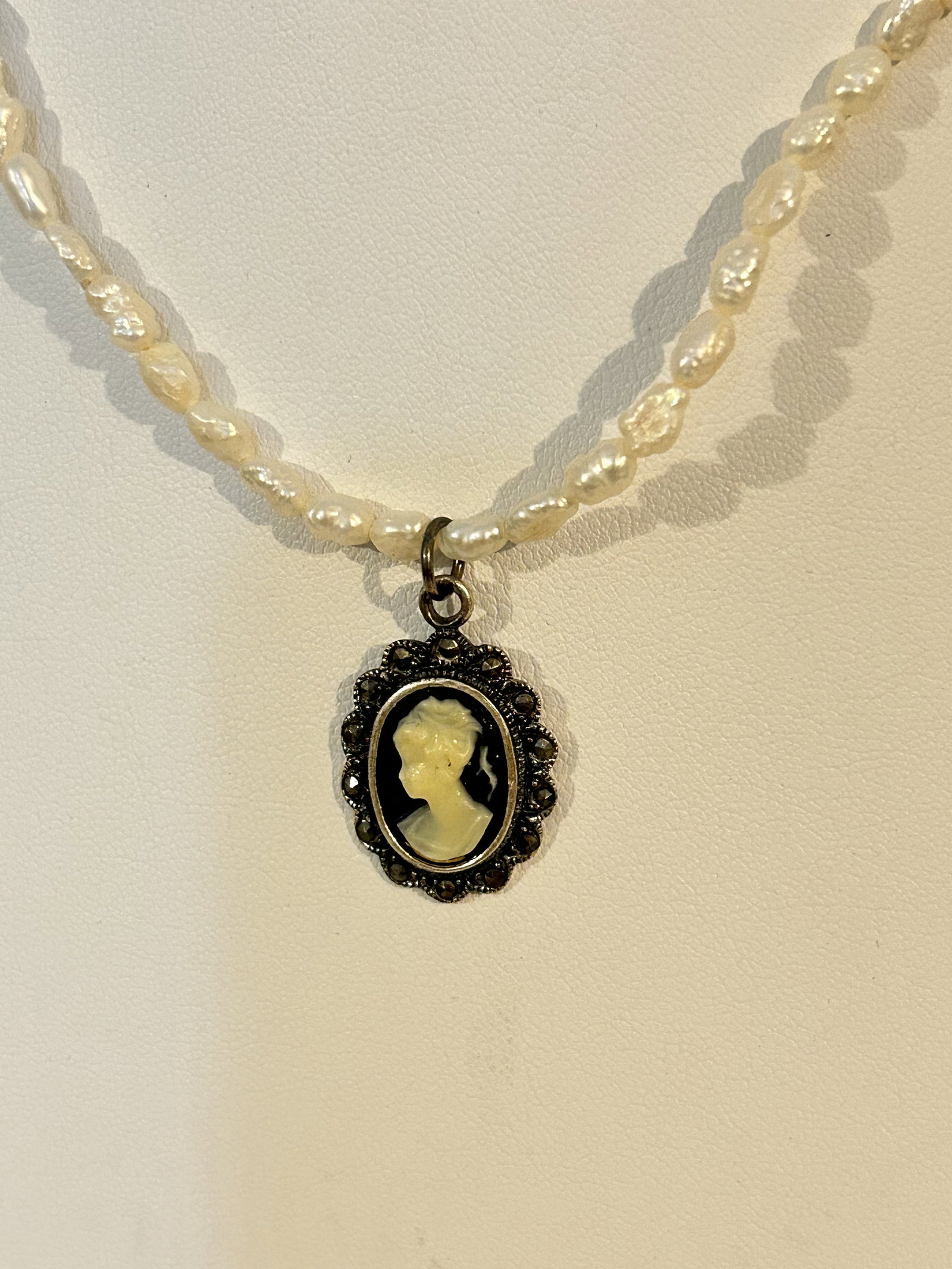 Vintage Sterling Silver pearl marcasite cameo Necklace 15": Vintage Sterling Silver pearl marcasite cameo Necklace 15" Please view all photos as they are part of the description and condition of this Item, Feel free to contact me with questions or picture requ