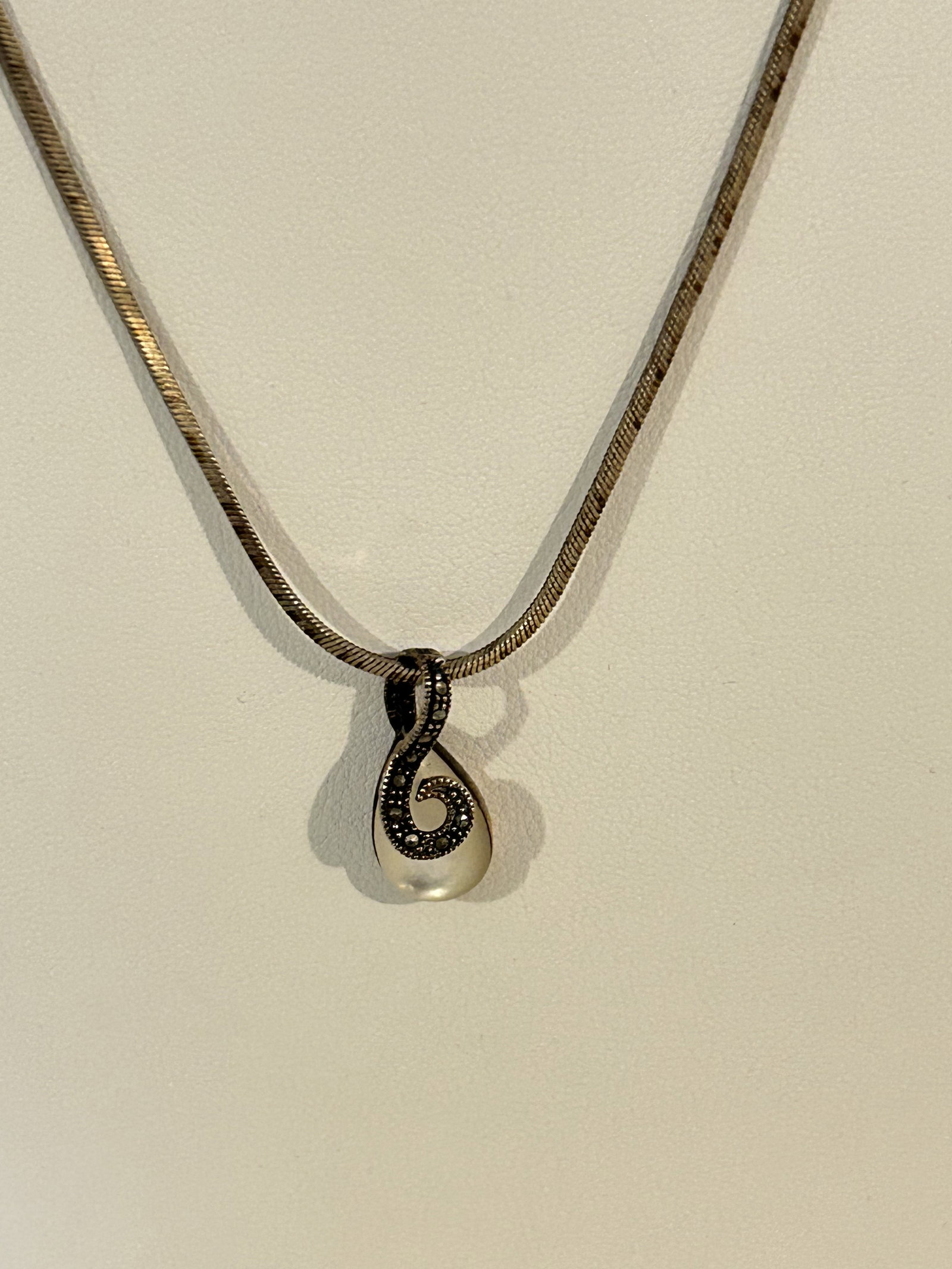 Vintage Sterling Silver mother of pearl marcasite pendant Necklace 29": Vintage Sterling Silver mother of pearl marcasite pendant Necklace 29" Please view all photos as they are part of the description and condition of this Item, Feel free to contact me with questions or 