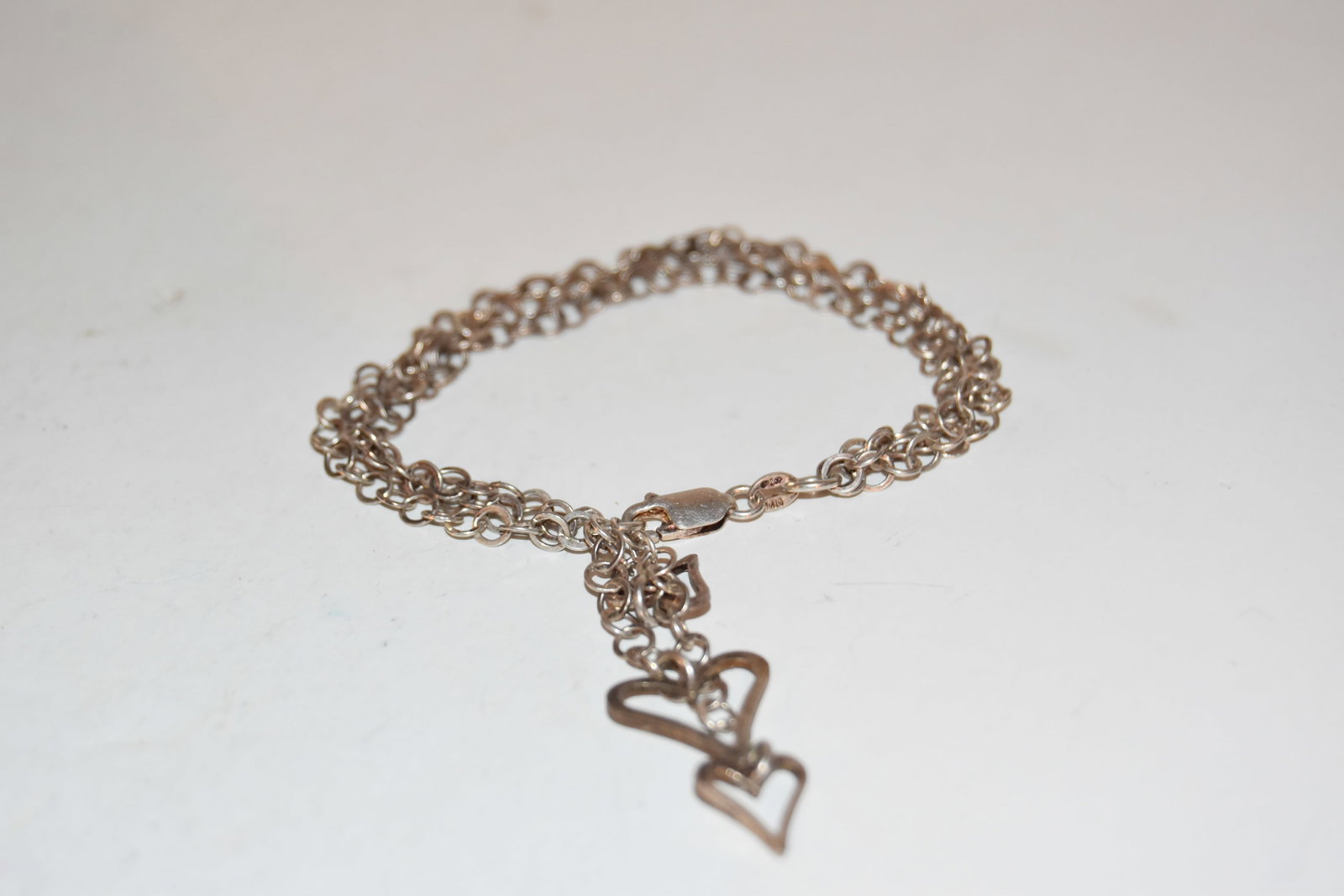 Vintage Sterling Silver heart triple Bracelet 8": Vintage Sterling Silver heart triple Bracelet 8" Please view all photos as they are part of the description and condition of this Item, Feel free to contact me with questions or picture requests! Used