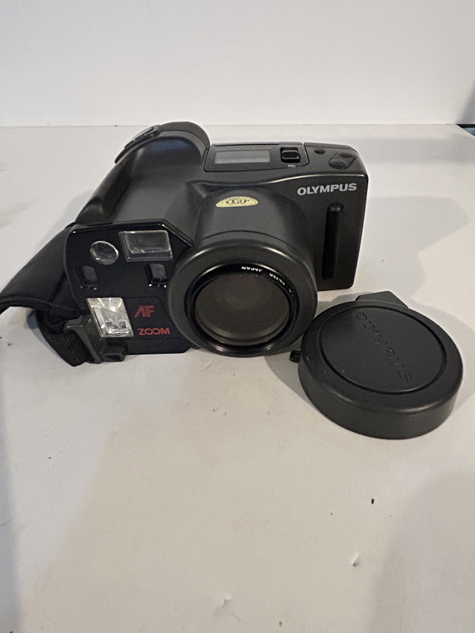 Olympus Infinity Superzoom 300 35mm SLR Film Camera, Made in Japan, WORKS: Olympus Infinity Superzoom 300 35mm SLR Film Camera, Made in Japan, WORKS Please view all photos as they are part of the description and condition of this Item, Feel free to contact me with questions 