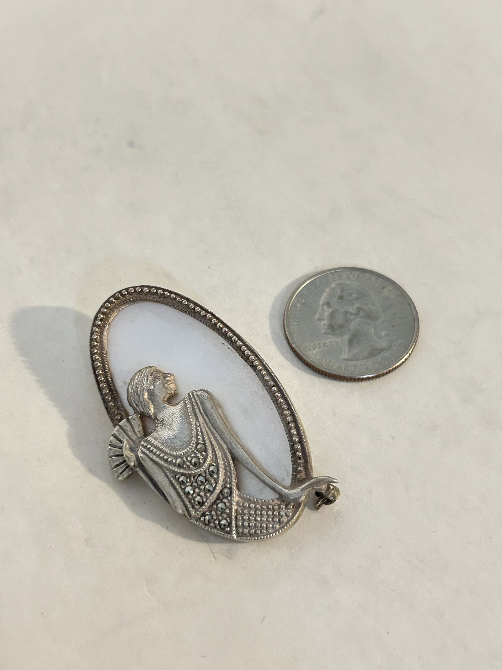 vintage sterling silver mother of pearl marcasite lady brooch 2": vintage sterling silver mother of pearl marcasite lady brooch 2" Please view all photos as they are part of the description and condition of this Item, Feel free to contact me with questions or pictur
