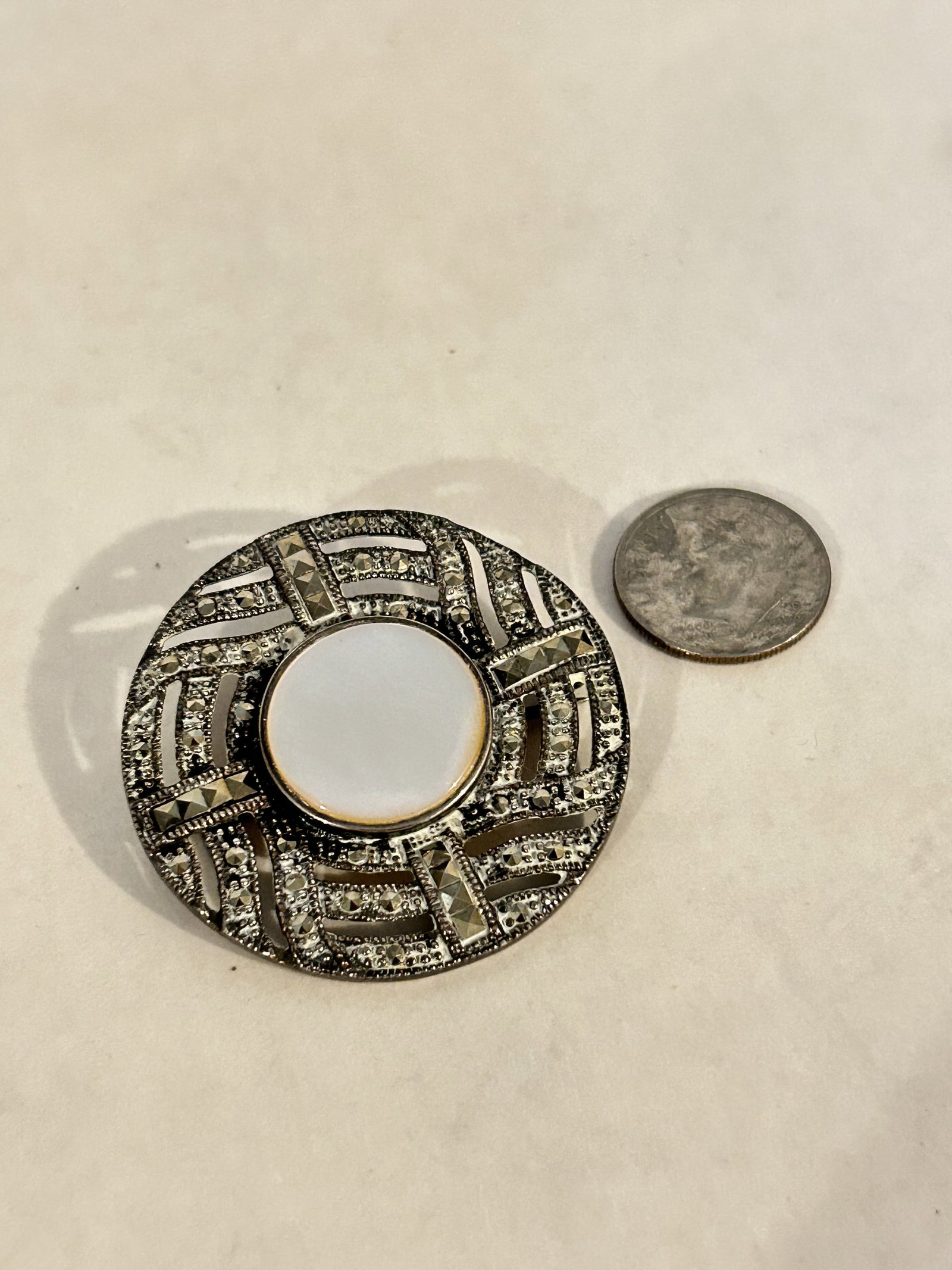 Vintage Sterling Silver thailand marcasite mother of pearl Brooch: Vintage Sterling Silver thailand marcasite mother of pearl Brooch Please view all photos as they are part of the description and condition of this Item, Feel free to contact me with questions or pictu