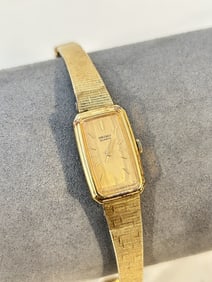 Seiko Watch Women 1320 Gold Dial Gold Tone Rectangle works great!!!