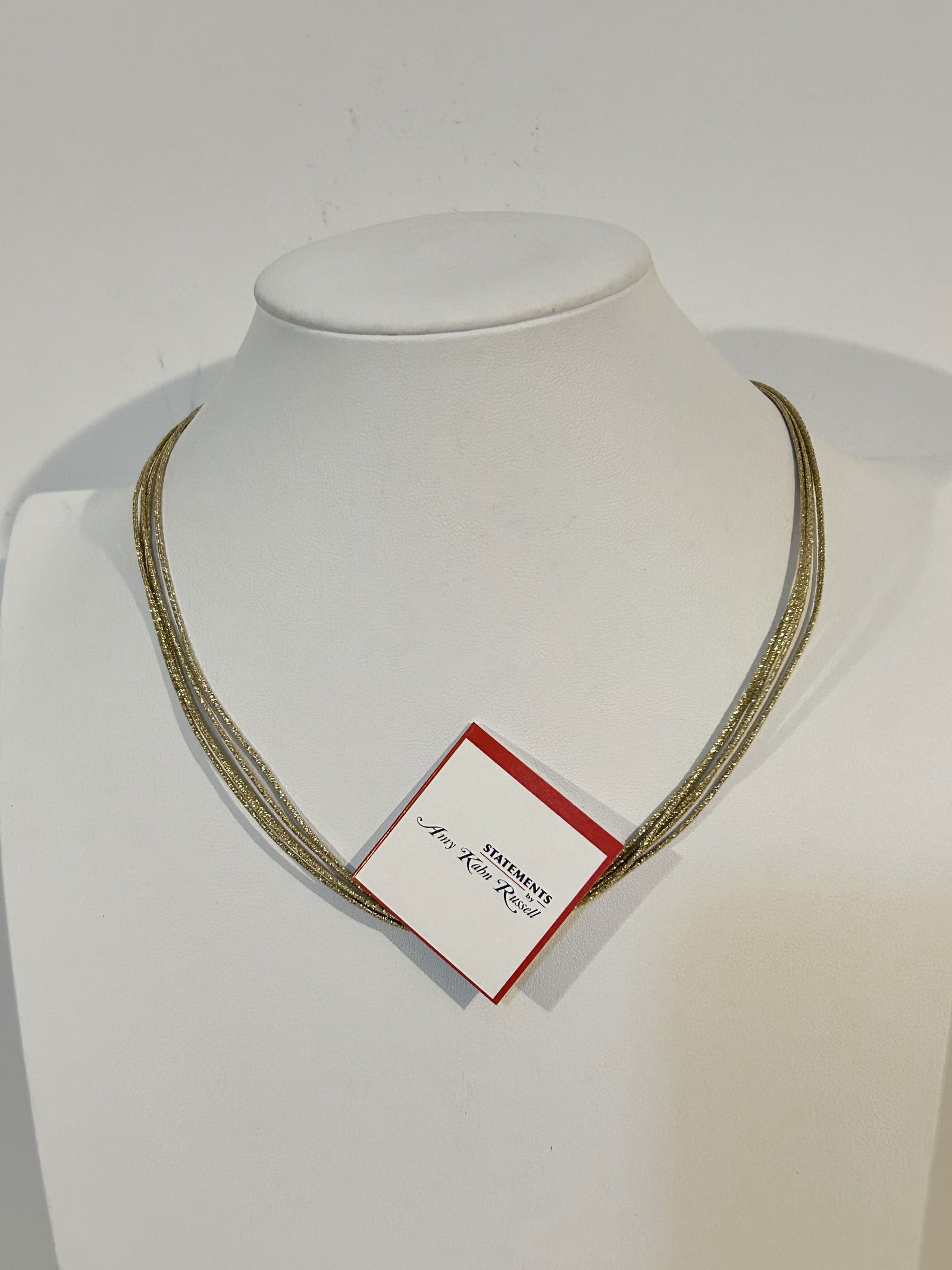 vintage amy kahn russell sterling 5 strand necklace 17": vintage amy kahn russell sterling 5 strand necklace 17" Please view all photos as they are part of the description and condition of this Item, Feel free to contact me with questions or picture request