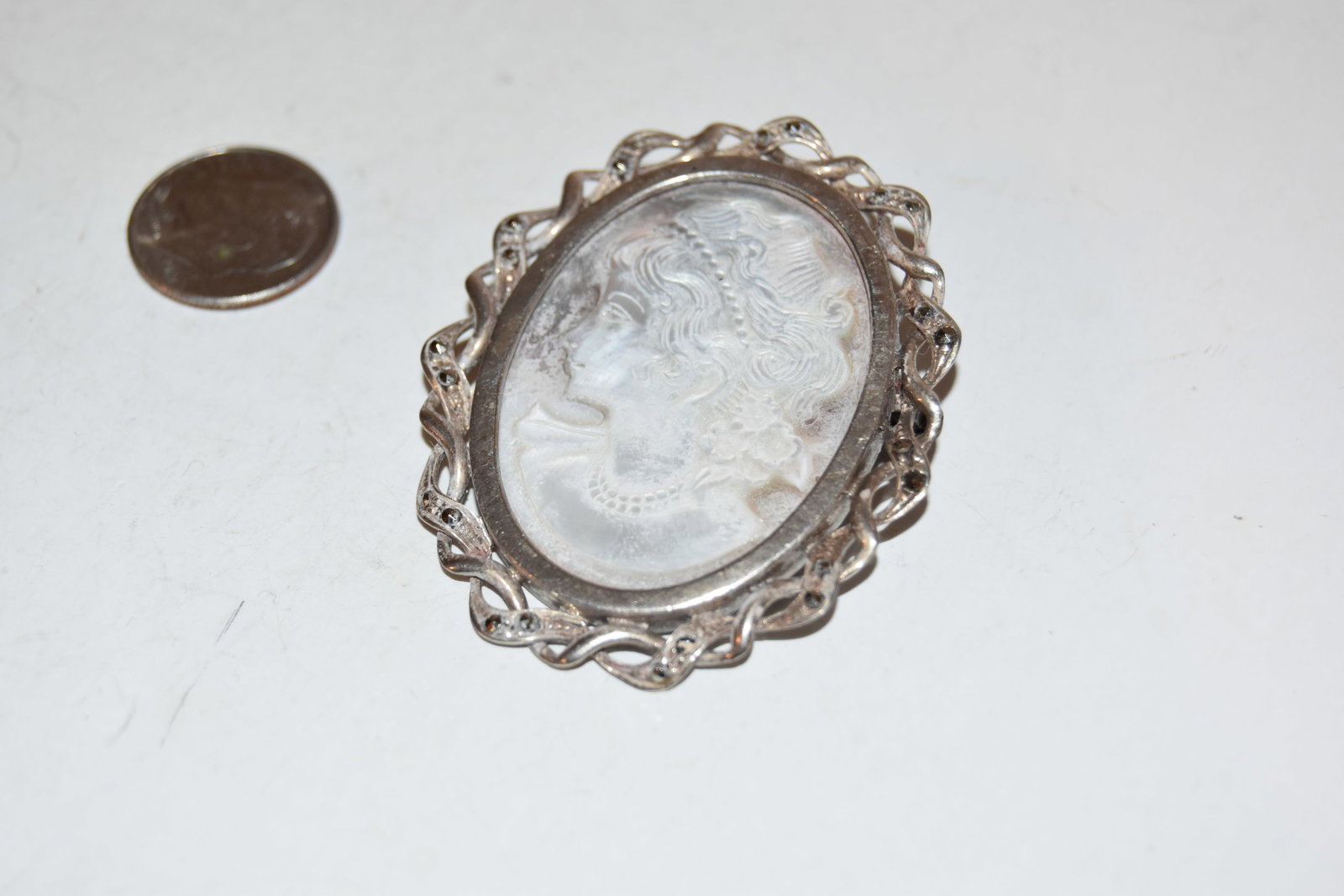 Vintage Sterling Silver Mother of pearl Lady Brooch 2": Vintage Sterling Silver Mother of pearl Lady Brooch 2" Please view all photos as they are part of the description and condition of this Item, Feel free to contact me with questions or picture requests