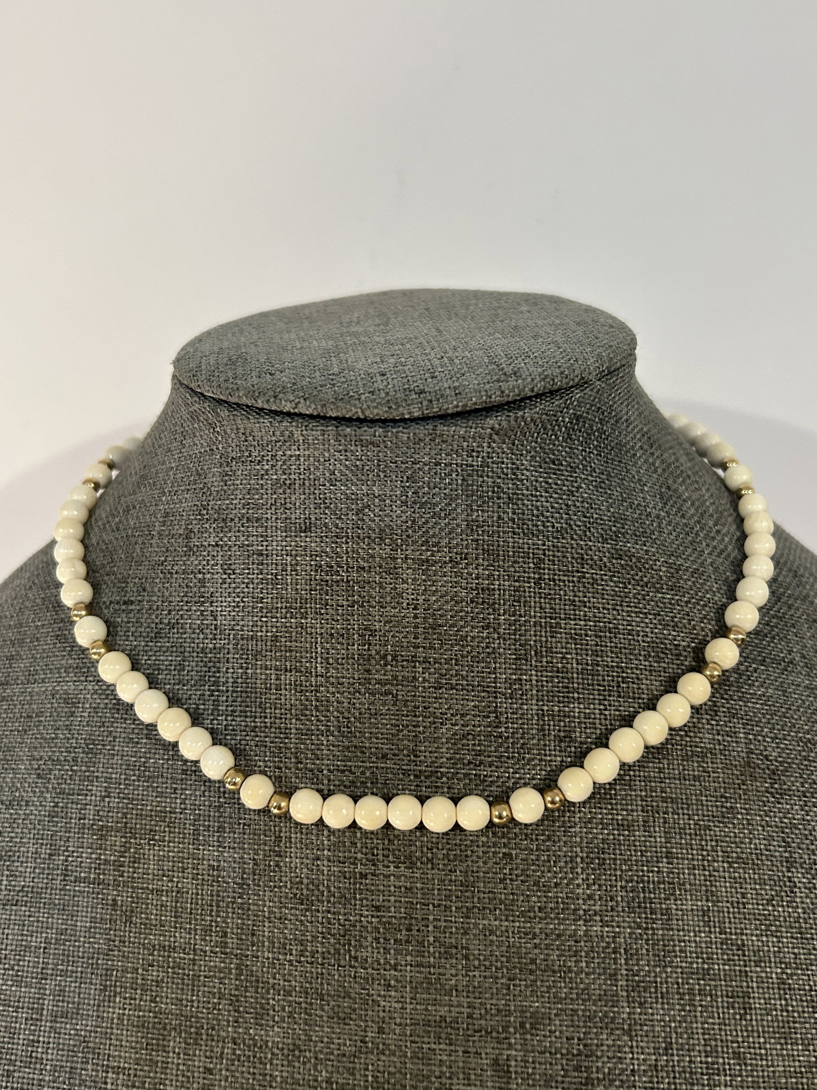 Vintage gold filled white beaded Neckalace: Vintage gold filled white beaded Neckalace Please view all photos as they are part of the description and condition of this Item, Feel free to contact me with questions or picture requests! Used Item 