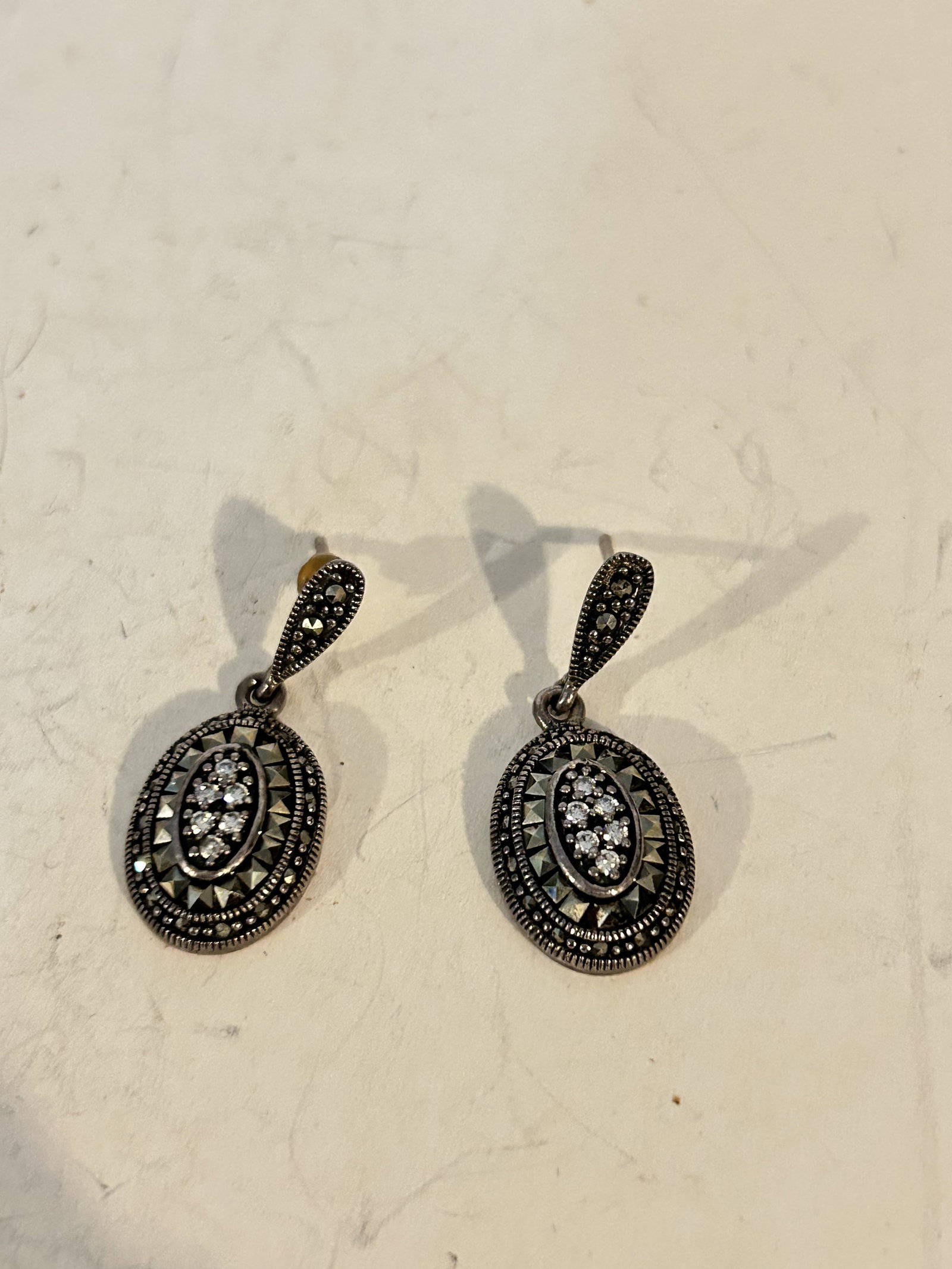 Vintage Sterling Silver marcasite Earrings 1 missing back: Vintage Sterling Silver marcasite Earrings 1 missing back Please view all photos as they are part of the description and condition of this Item, Feel free to contact me with questions or picture reque