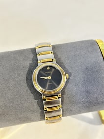 Fossil Steel FS-2698 Two Tone Quartz Analog Women's Watch works great!!! Light scratches to face