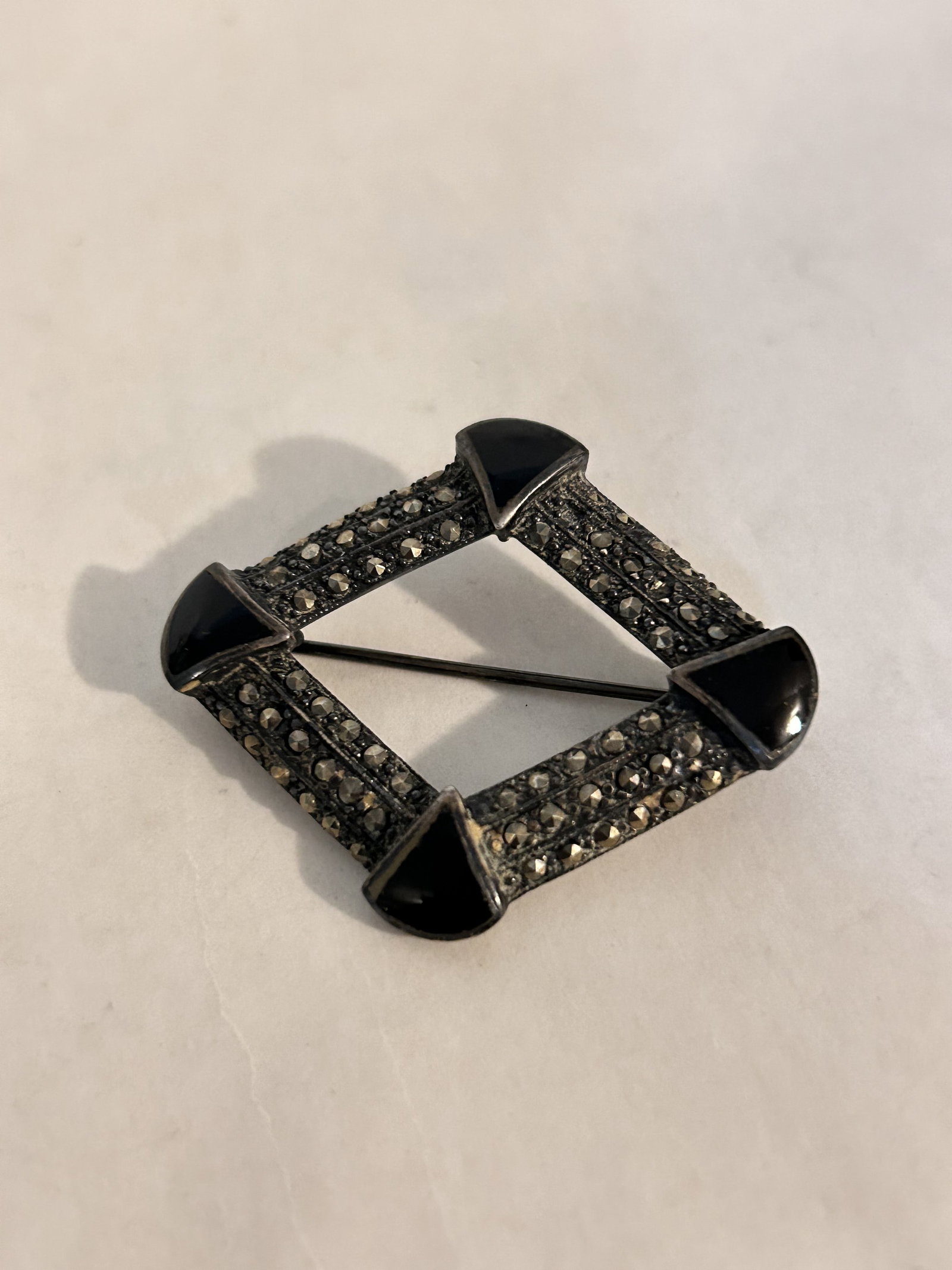 Vintage Sterling Silver marcasite onyx Brooch: Vintage Sterling Silver marcasite onyx Brooch Please view all photos as they are part of the description and condition of this Item, Feel free to contact me with questions or picture requests! Used It