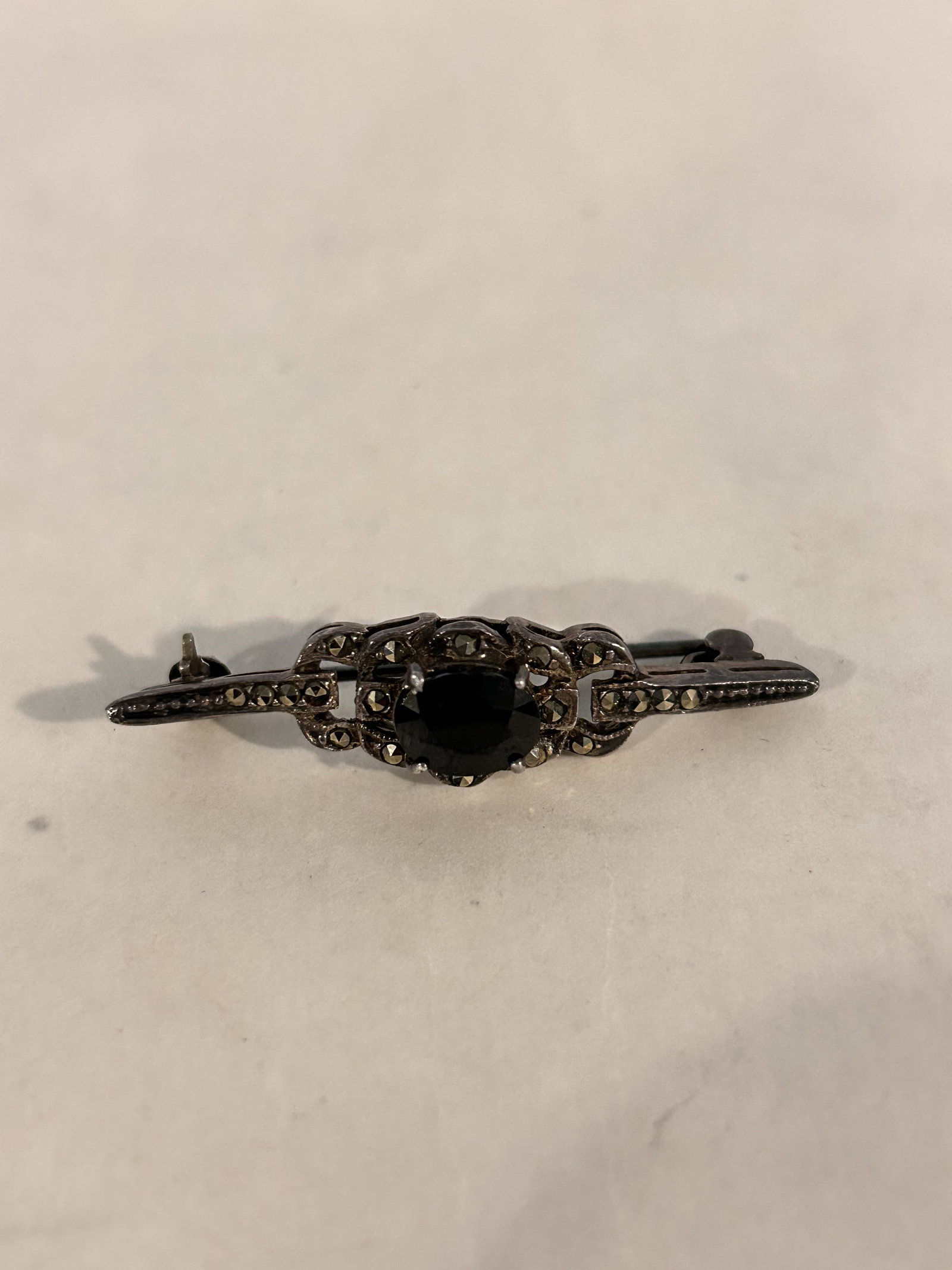 Vintage Sterling Silver marcasite tourmaline Brooch: Vintage Sterling Silver marcasite tourmaline Brooch Please view all photos as they are part of the description and condition of this Item, Feel free to contact me with questions or picture requests! U