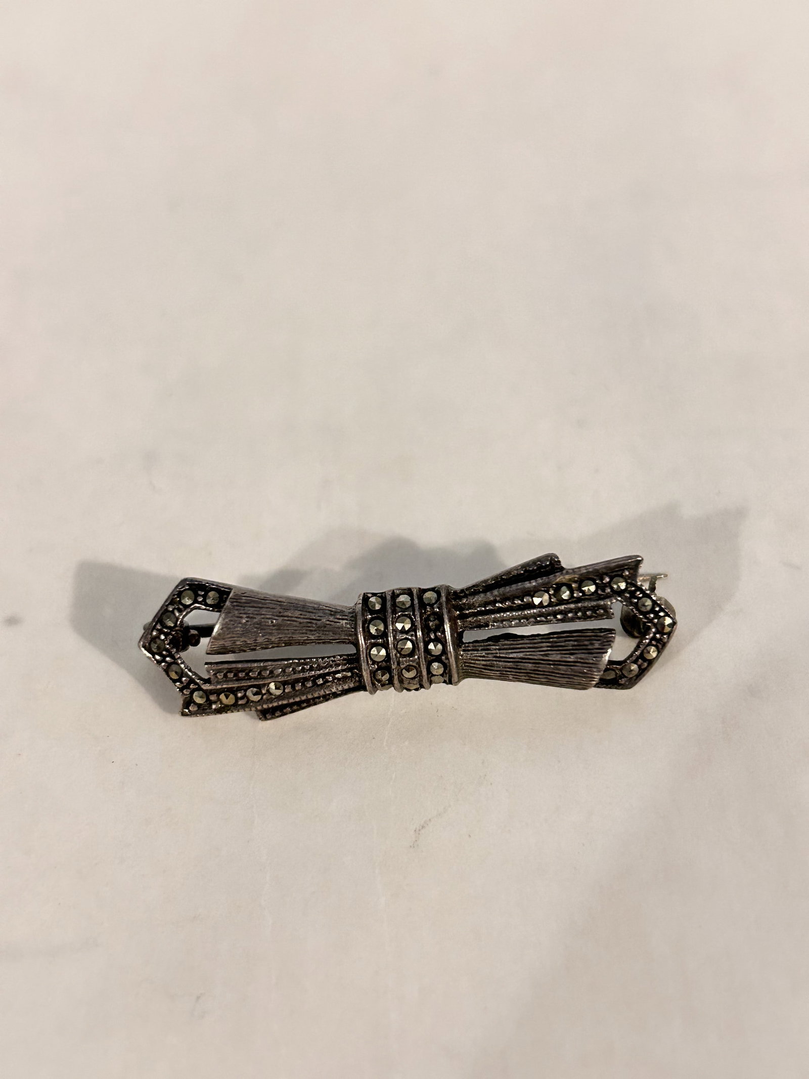 Vintage Sterling Silver marcasite Brooch: Vintage Sterling Silver marcasite Brooch Please view all photos as they are part of the description and condition of this Item, Feel free to contact me with questions or picture requests! Used Item AS