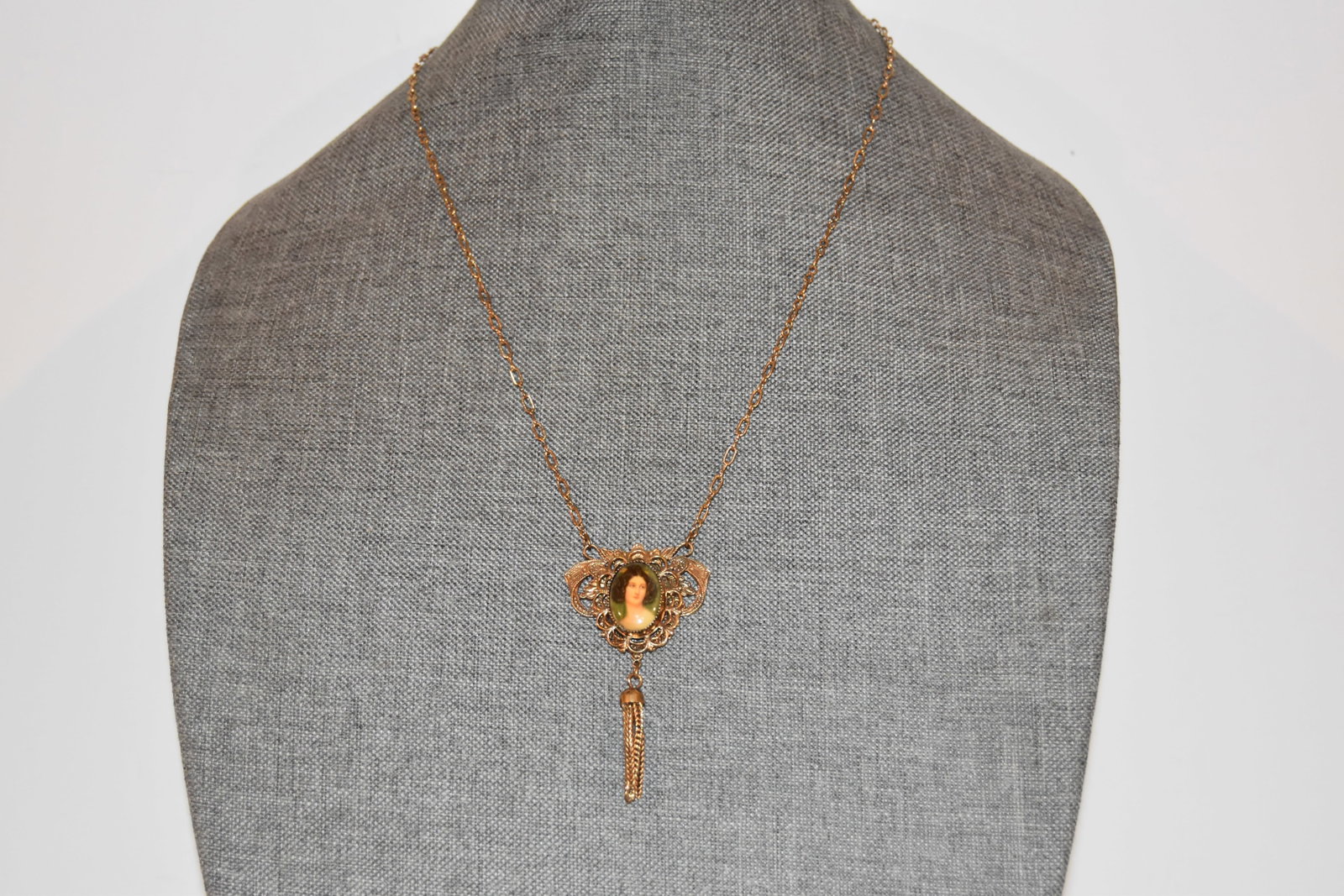 Vintage gold tone hand painted lady pendant Necklace.: Vintage gold tone hand painted lady pendant Necklace. Please view all photos as they are part of the description and condition of this Item, Feel free to contact me with questions or picture requests!