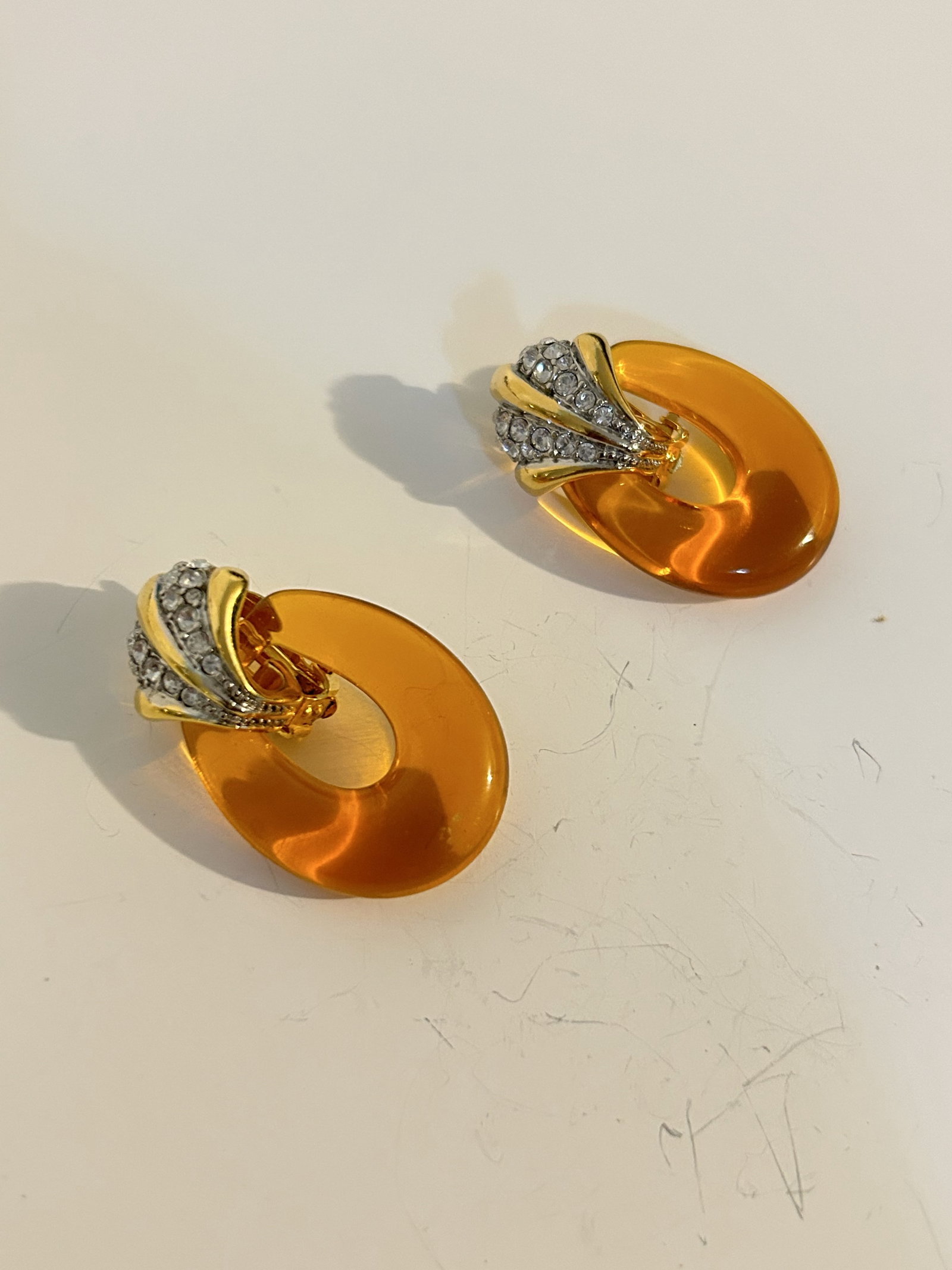 VTG Joan Rivers Simulated Amber Art Glass Bead Gold tone rhinestone pierced Earrings: VTG Joan Rivers Simulated Amber Art Glass Bead Gold tone rhinestone pierced Earrings Please view all photos as they are part of the description and condition of this Item, Feel free to contact me with