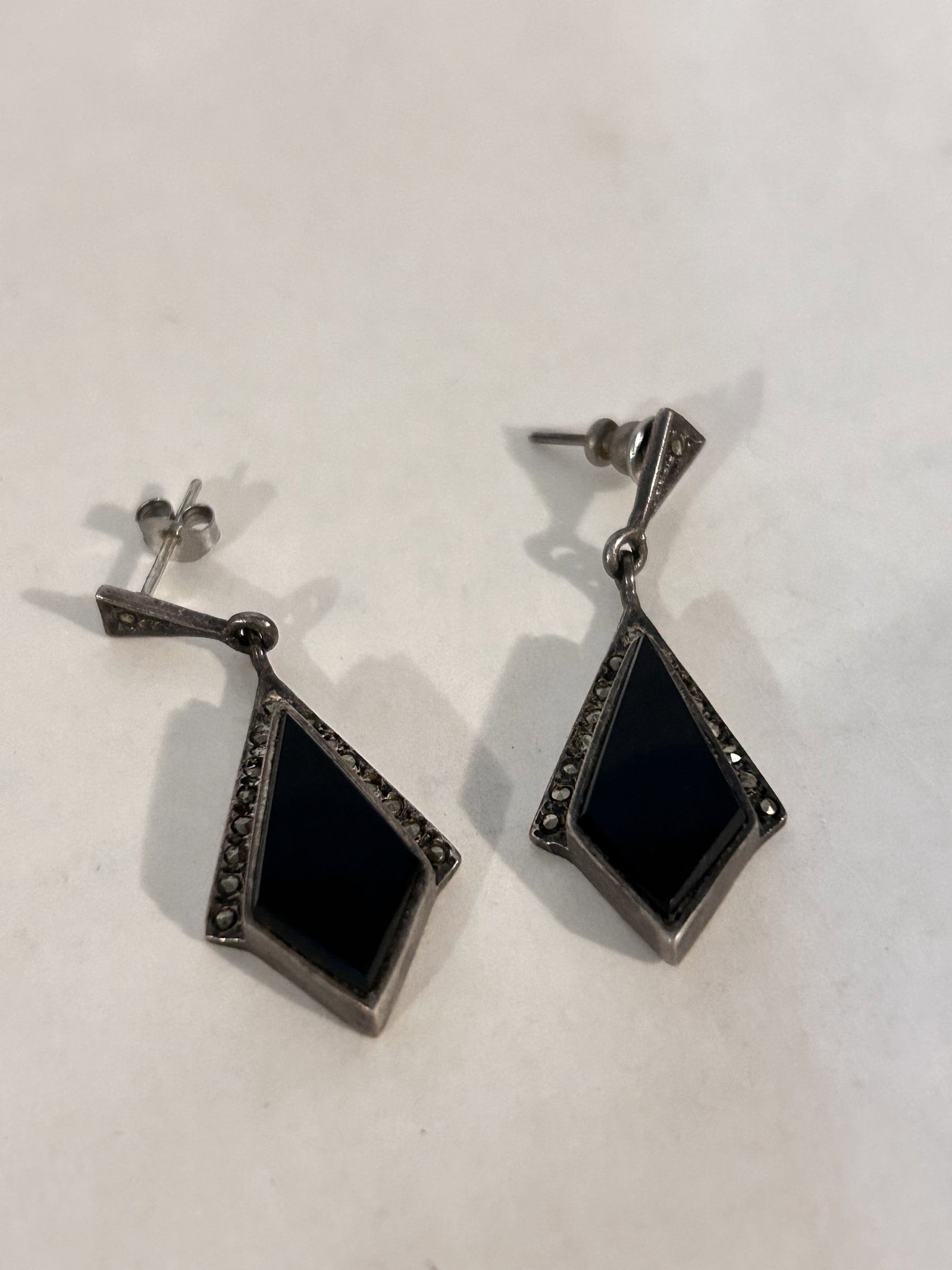 Vintage Sterling Silver marcasite onyx earrings: Vintage Sterling Silver marcasite onyx earrings Please view all photos as they are part of the description and condition of this Item, Feel free to contact me with questions or picture requests! Used 