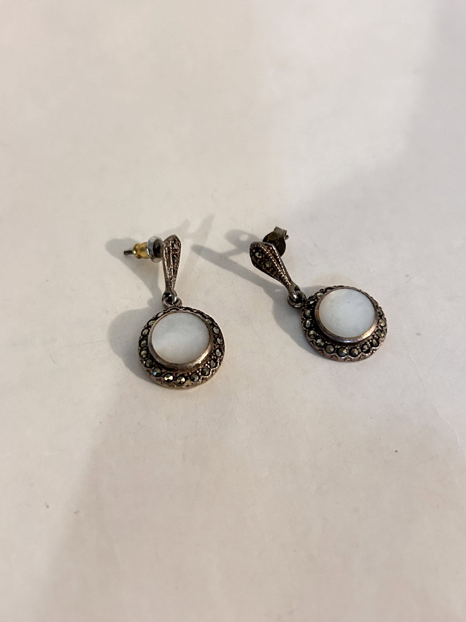 Vintage Sterling Silver marcasite mother of pearl earrings: Vintage Sterling Silver marcasite mother of pearl earrings Please view all photos as they are part of the description and condition of this Item, Feel free to contact me with questions or picture requ