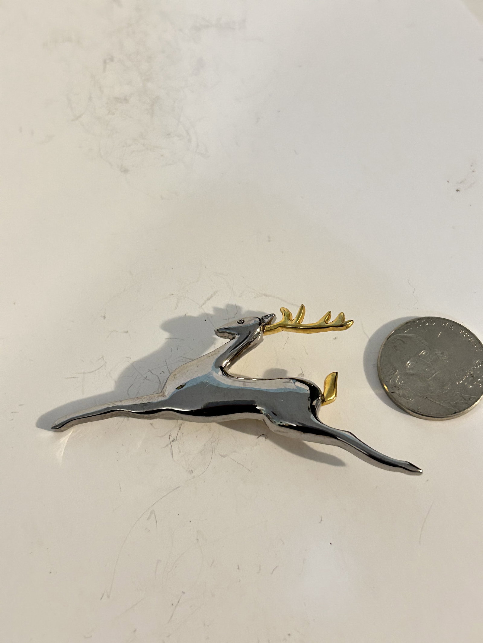 vintage liz claiborne deer brooch: vintage liz claiborne deer brooch Please view all photos as they are part of the description and condition of this Item, Feel free to contact me with questions or picture requests! Used Item AS IS