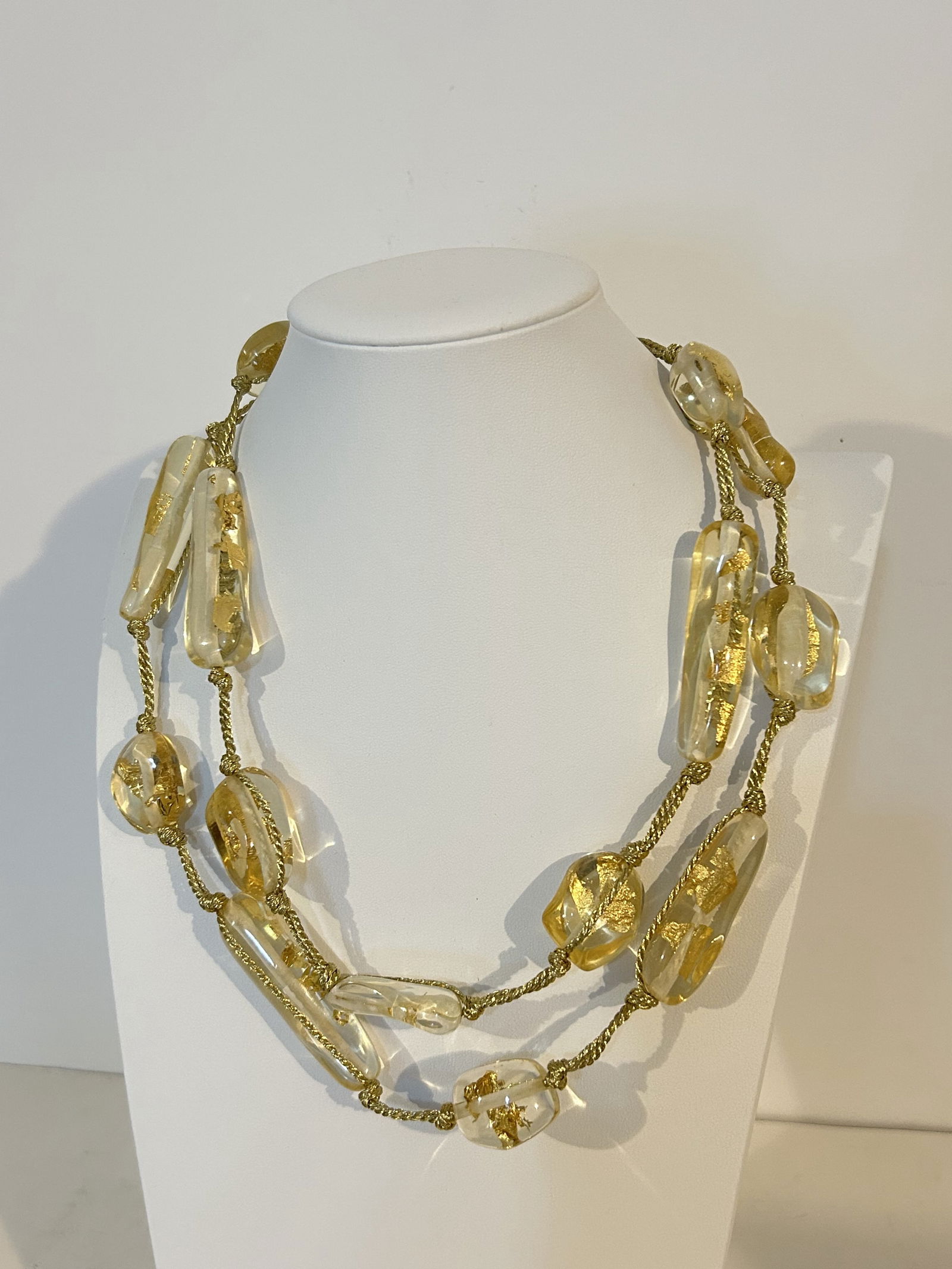 Monies -Gerda Lynggaard Gold flakes In Acrylic Necklace signed 42": Monies -Gerda Lynggaard Gold flakes In Acrylic Necklace signed 42" Please view all photos as they are part of the description and condition of this Item, Feel free to contact me with questions or pict