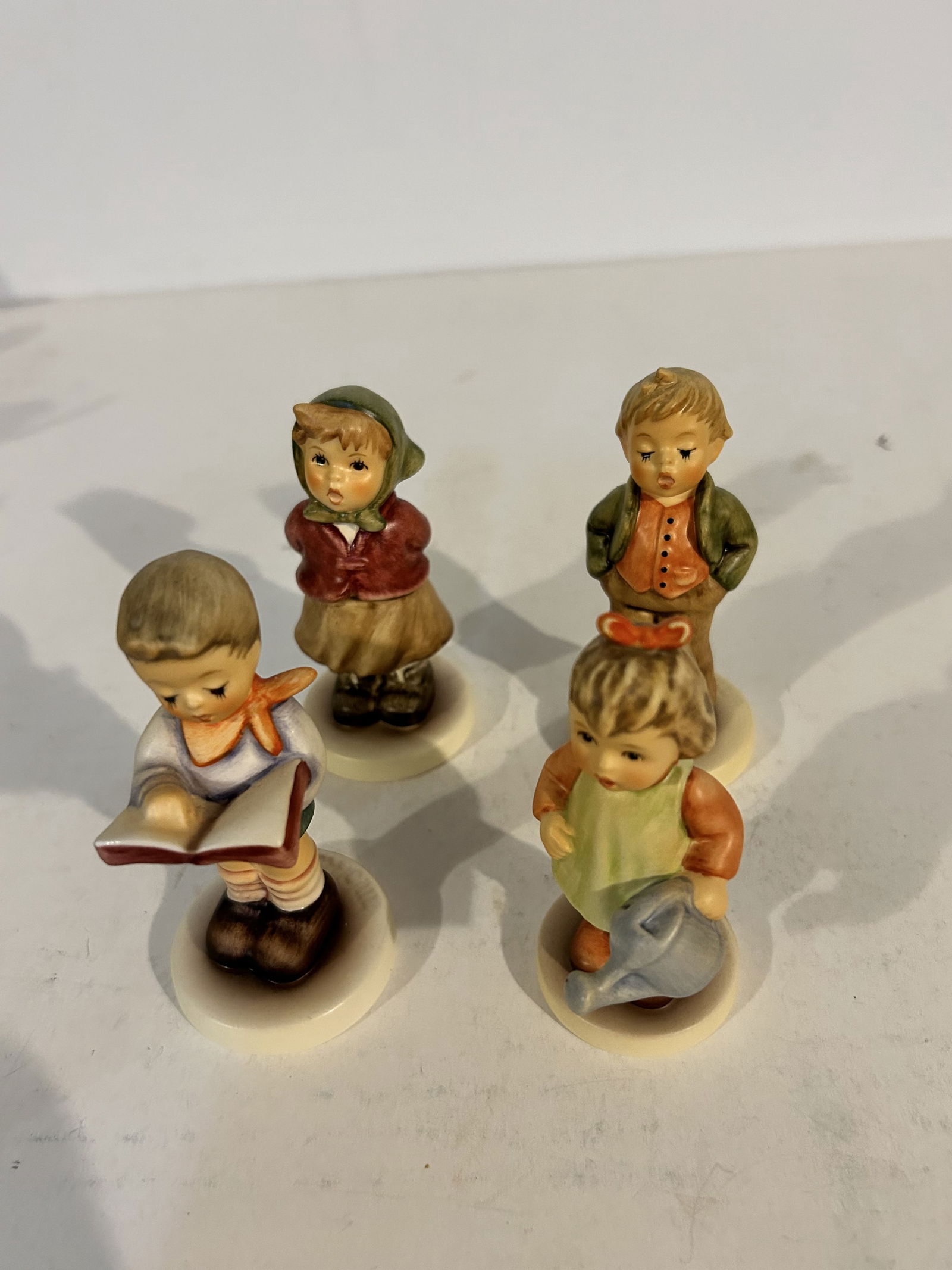 Vintage lot of 4 Hummel figurines #848 #729 #2087 #2181: Vintage lot of 4 Hummel figurines #848 #729 #2087 #2181 Please view all photos as they are part of the description and condition of this Item, Feel free to contact me with questions or picture request
