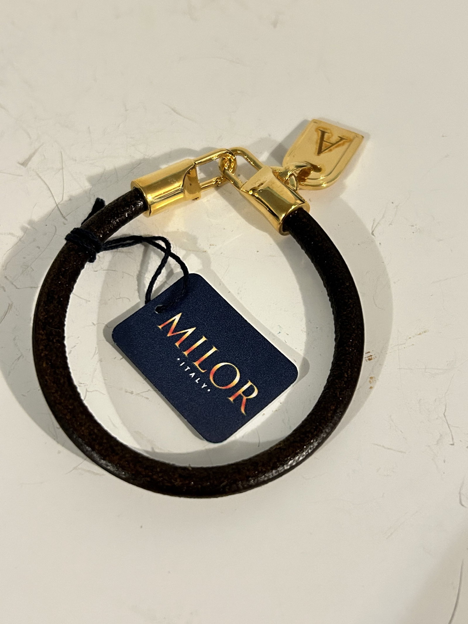 Gold Tone Bronze Initial Tag A Leather Bracelet by Milor Italy 8: Gold Tone Bronze Initial Tag A Leather Bracelet by Milor Italy 8” Please view all photos as they are part of the description and condition of this Item, Feel free to contact me with questions or