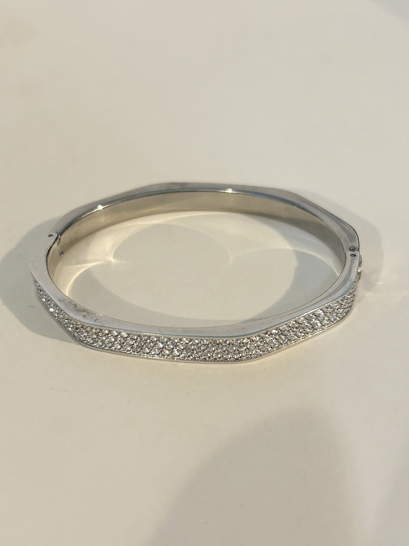 Swarovski rhodium plated hinged bangle bracelet vintage 6.75 inches: Swarovski rhodium plated hinged bangle bracelet vintage 6.75 inches Please view all photos as they are part of the description and condition of this Item, Feel free to contact me with questions or pic