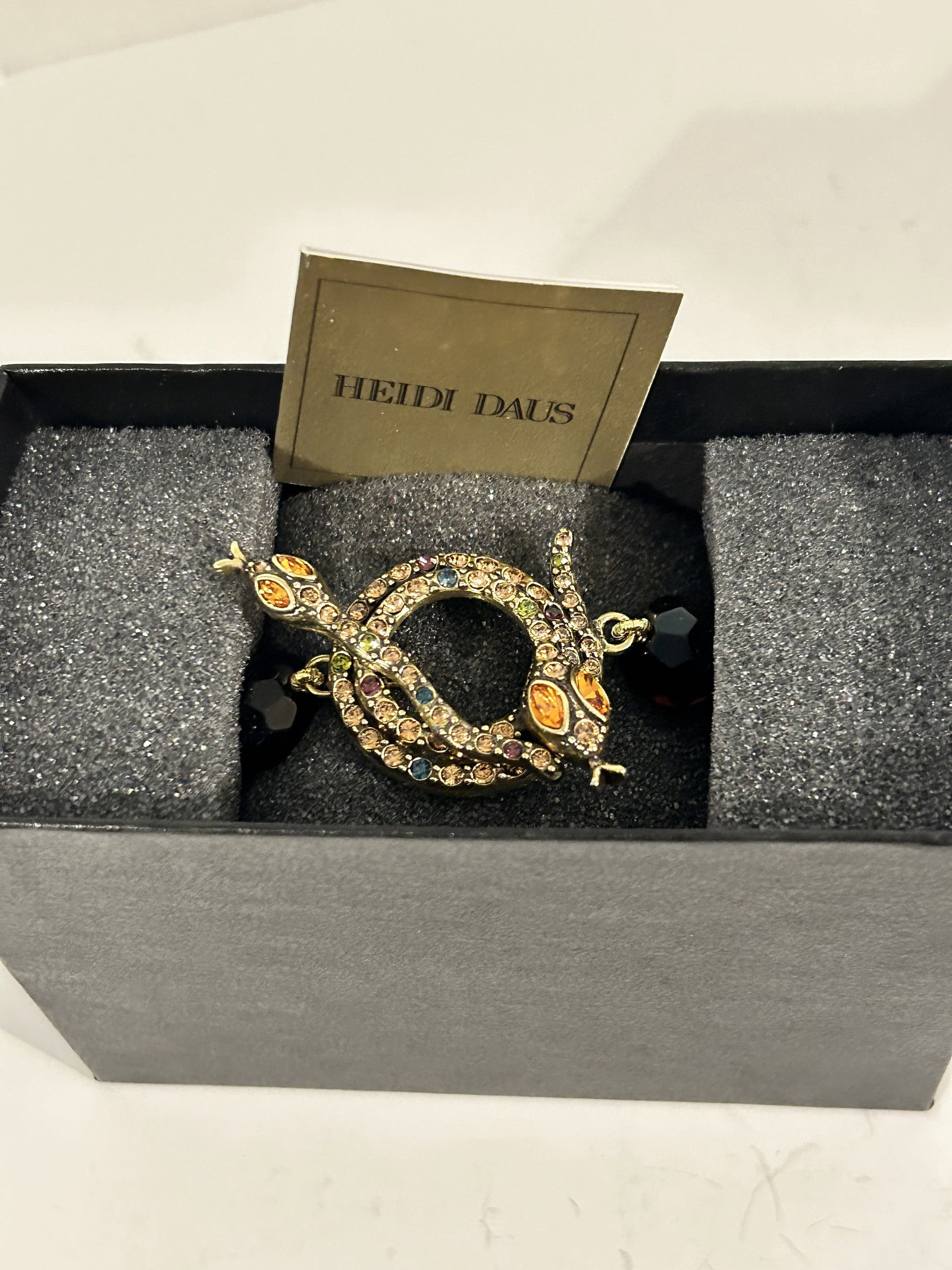 Heidi Daus Swarovski Crystal Snake cherry beaded Bracelet: Heidi Daus Swarovski Crystal Snake cherry beaded Bracelet Please view all photos as they are part of the description and condition of this Item, Feel free to contact me with questions or picture reque