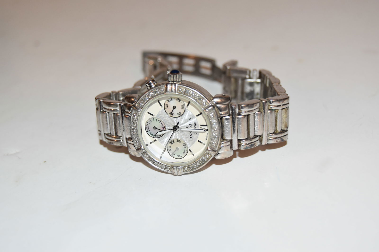 Anne Klein AK Diamond Accented Bezel Women's Watch works great!!: Anne Klein AK Diamond Accented Bezel Women's Watch works great!! Please view all photos as they are part of the description and condition of this Item, Feel free to contact me with questions or pictur