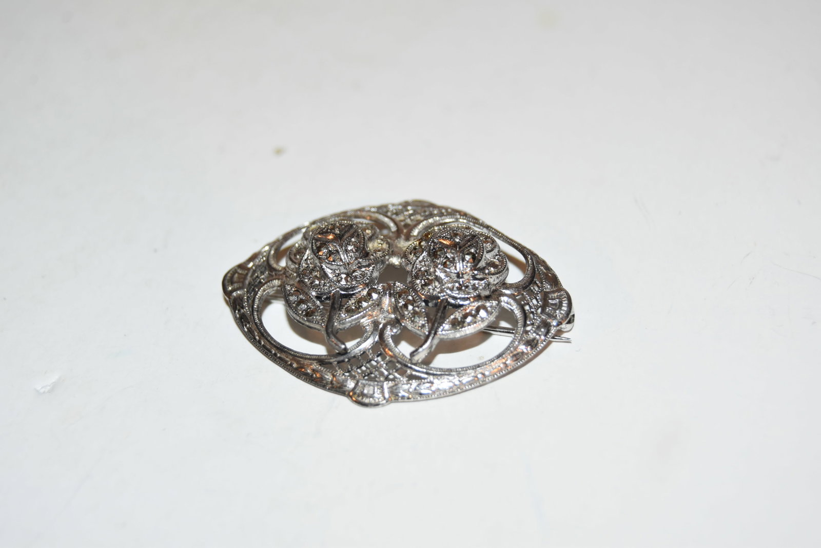 Vintage Sterling Silver marcasite flower brooch: Vintage Sterling Silver marcasite flower brooch Please view all photos as they are part of the description and condition of this Item, Feel free to contact me with questions or picture requests! Used 
