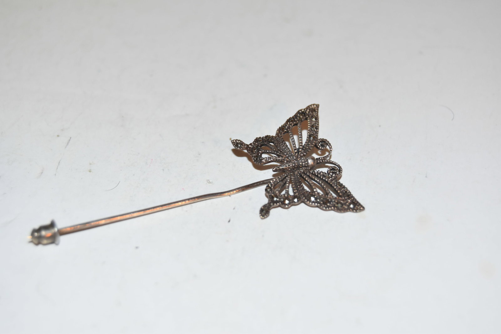 Vintage Sterling Silver butterfly marcasite hat pin: Vintage Sterling Silver butterfly marcasite hat pin Please view all photos as they are part of the description and condition of this Item, Feel free to contact me with questions or picture requests! U