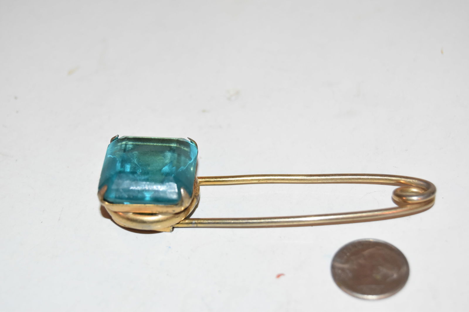 Vintage brass blue stone pin Brooch (1 of 3)