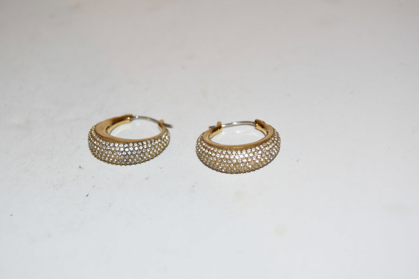 Michael Kors Goldtone MK Crystal pierced Studs: Michael Kors Goldtone MK Crystal pierced Studs Please view all photos as they are part of the description and condition of this Item, Feel free to contact me with questions or picture requests! Used I