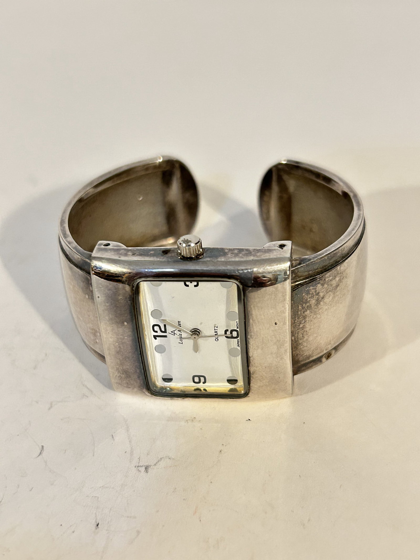 Louis Arden Bangle Watch bracelet works great!!!: Louis Arden Bangle Watch bracelet works great!!! Please view all photos as they are part of the description and condition of this Item, Feel free to contact me with questions or picture requests! Used