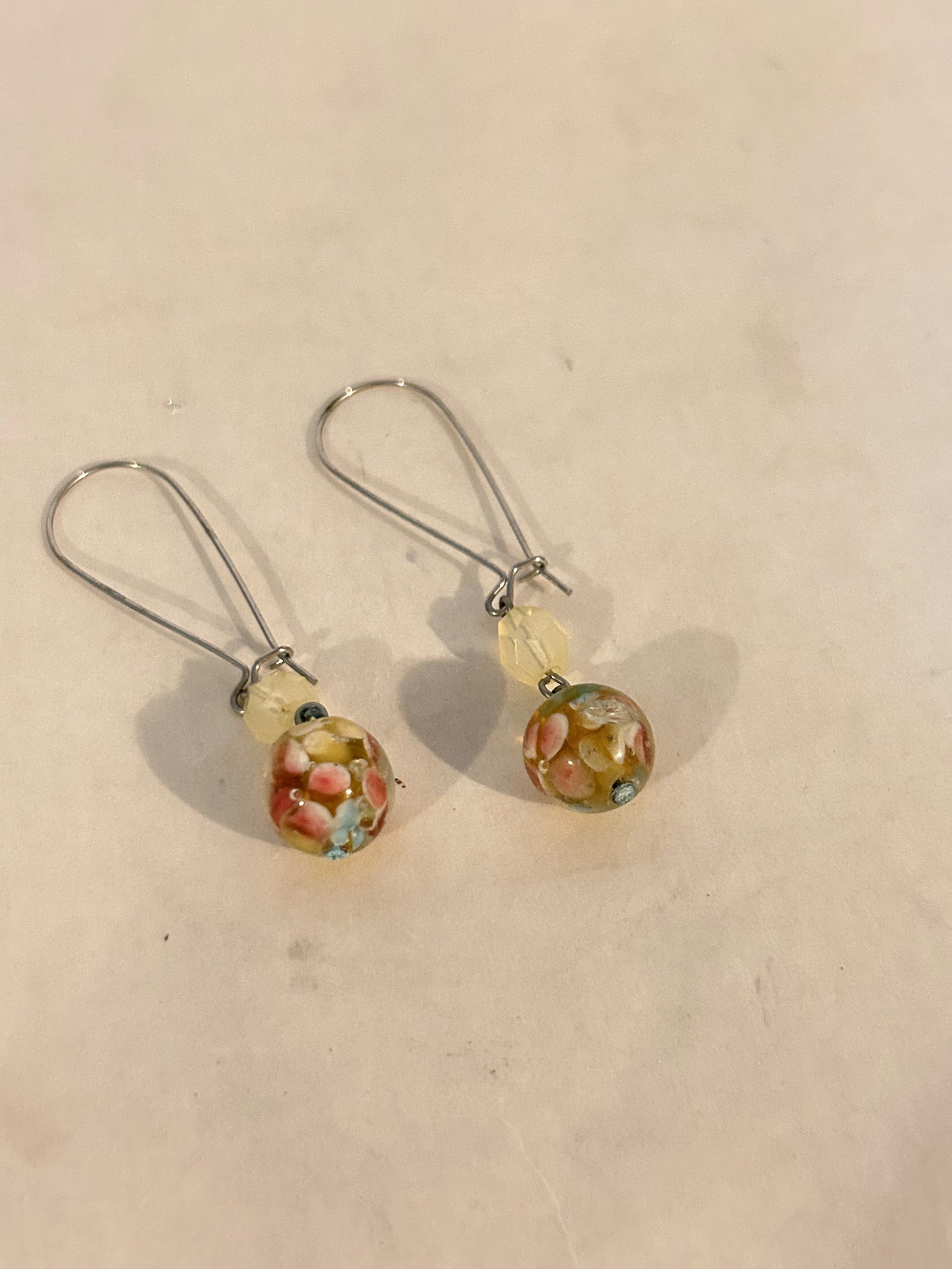 Vintage Murano glass dangle earrings: Vintage Murano glass dangle earrings Please view all photos as they are part of the description and condition of this Item, Feel free to contact me with questions or picture requests! Used Item AS IS