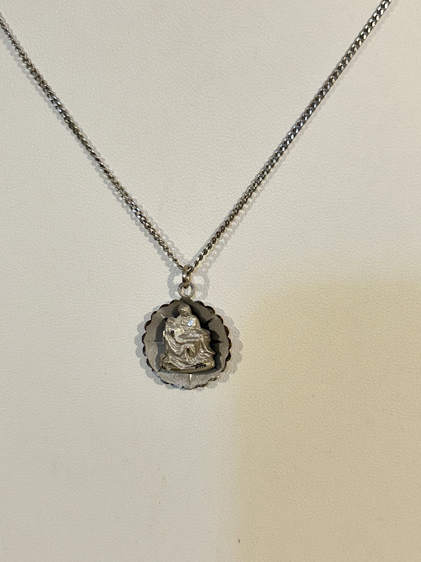 VTG Sterling Silver Catholic La Pieta Statue Pendant 16" Necklace: VTG Sterling Silver Catholic La Pieta Statue Pendant 16" Necklace Please view all photos as they are part of the description and condition of this Item, Feel free to contact me with questions or pictu