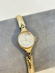 Vintage Bulova 10K Gold Rolled Manual Womens Watch works great!!!