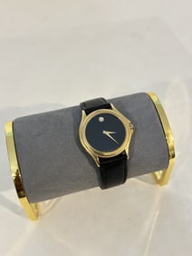 Movado Museum Gold Tone Men's Watch 87 E4 0863 works great!!!