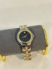 MOVADOModern Classic Black Dial Two-tone Men's Watch works great!!!
